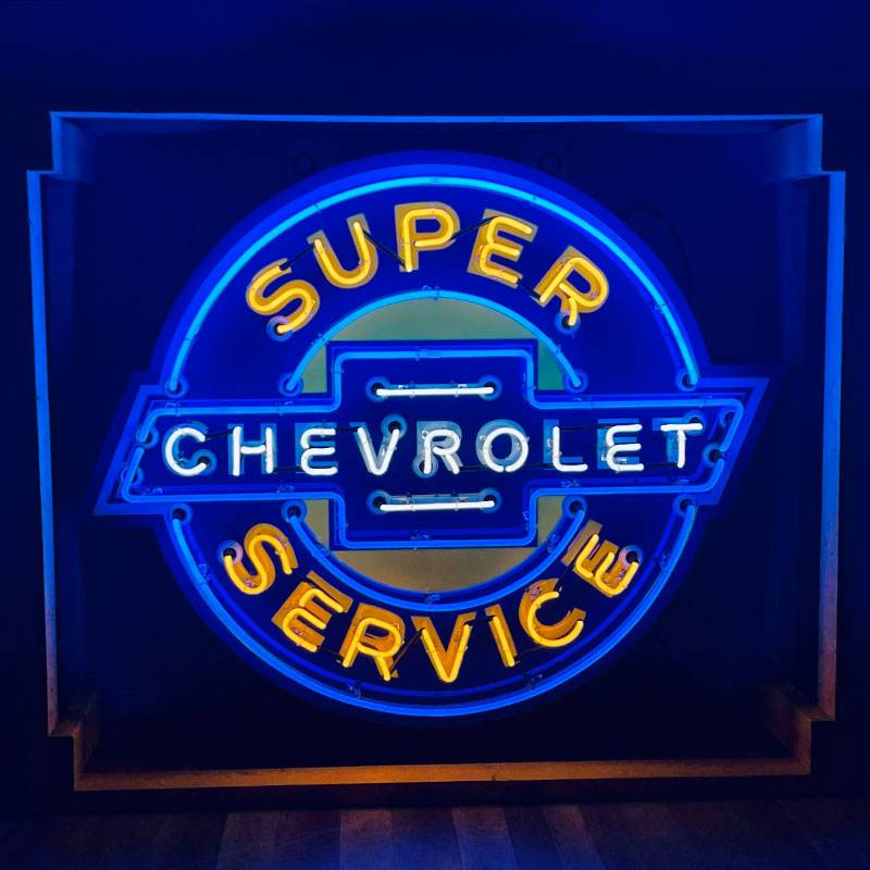 Neon road chevrolet super service sign