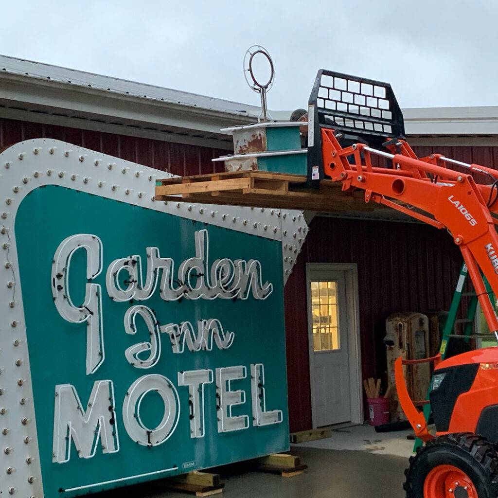 Neon road garden inn motel sign during restoration