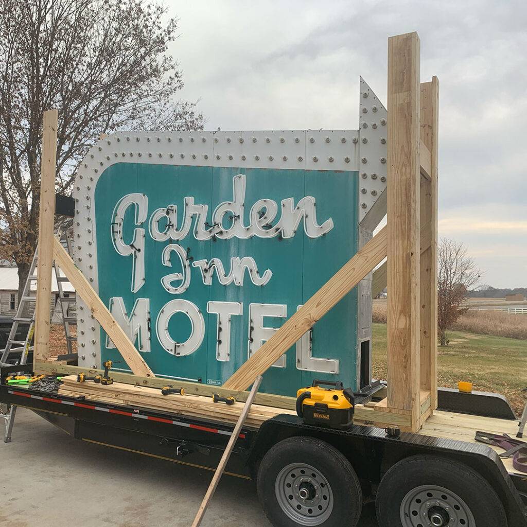 Neon road garden inn motel sign during restoration