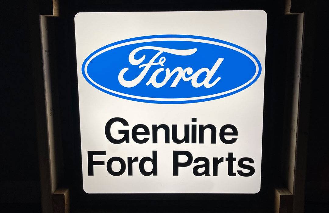 Neon road genuine ford parts sign