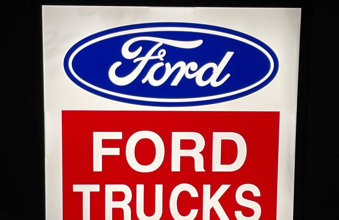 Neon road ford trucks sign