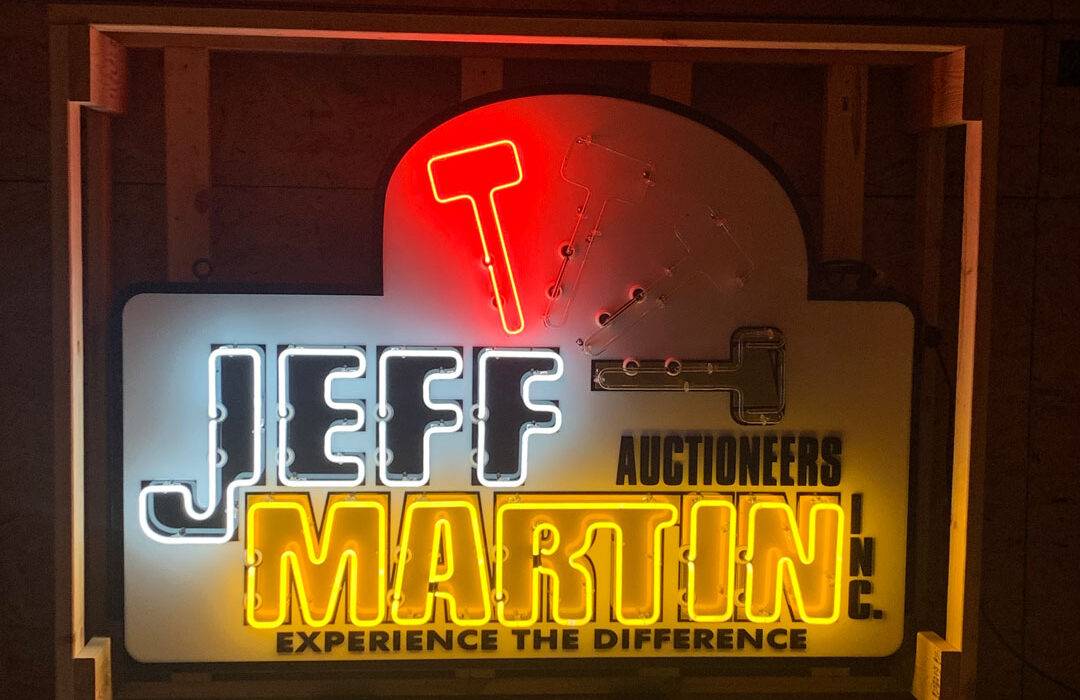 Jeff Martin Auctioneers Neon road sign