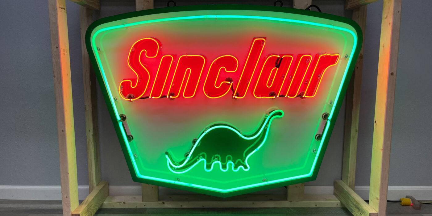 Neon road sinclar red and green sign