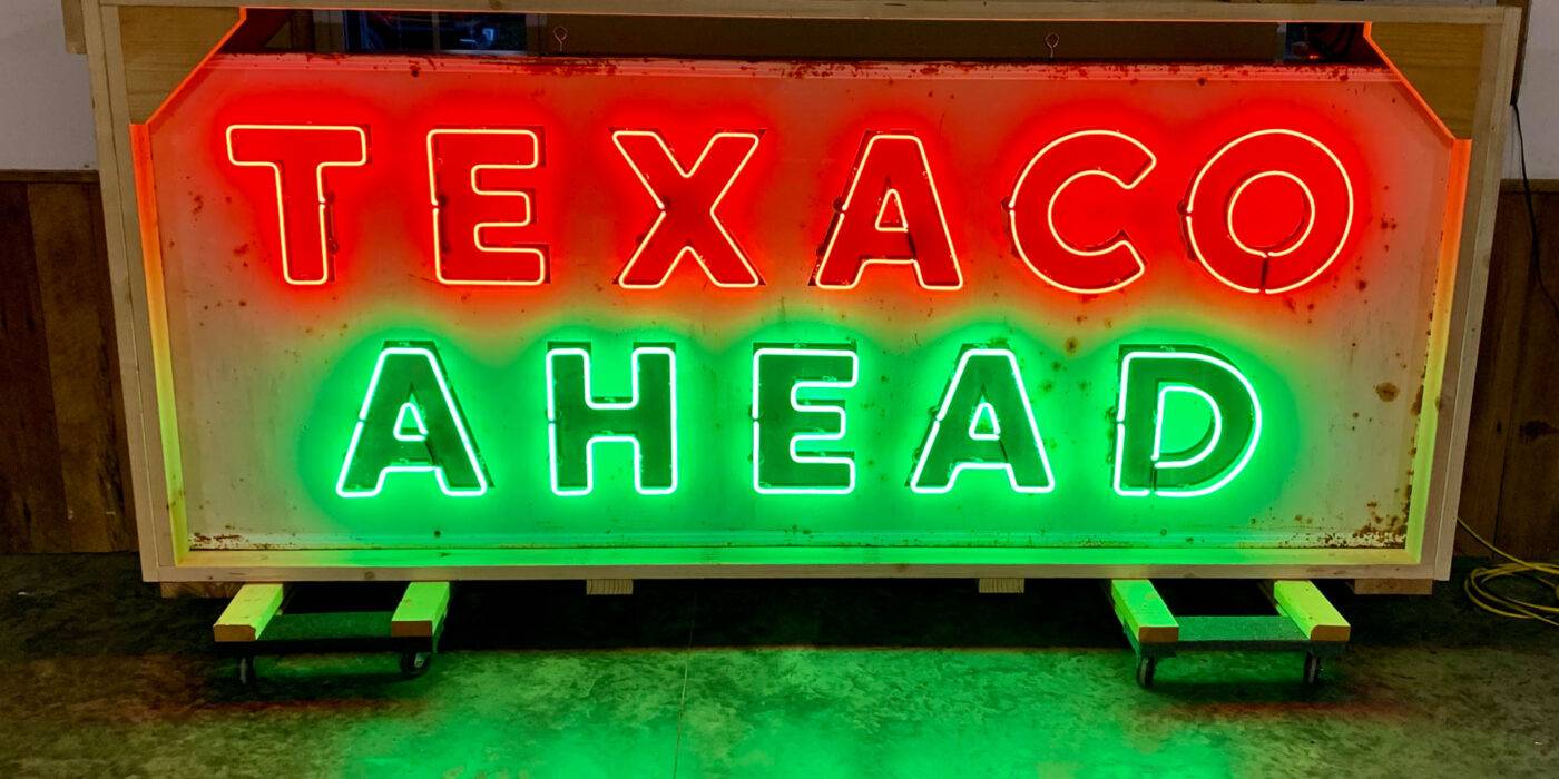 Neon Road texaco ahead red and green sign