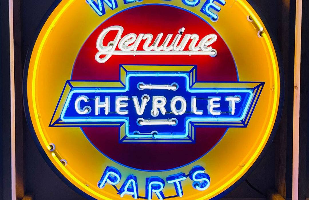 Neon road genuine chevrolet parts sign