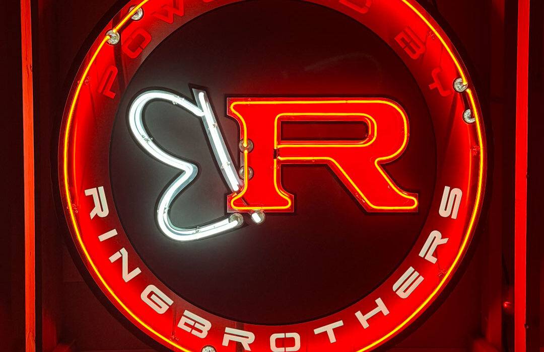 Neon road red ring brothers sign